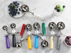 New Star Foodservice 537713 Commercial-Grade Thumb Press Food Disher/Ice Cream Scoop, 18/8 Stainless Steel, 2 oz, Size 20, Orange